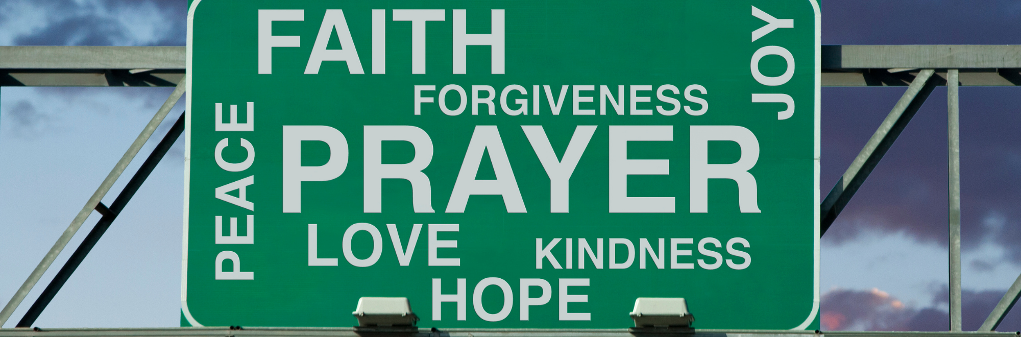 A road sign with faith-related words written all over it