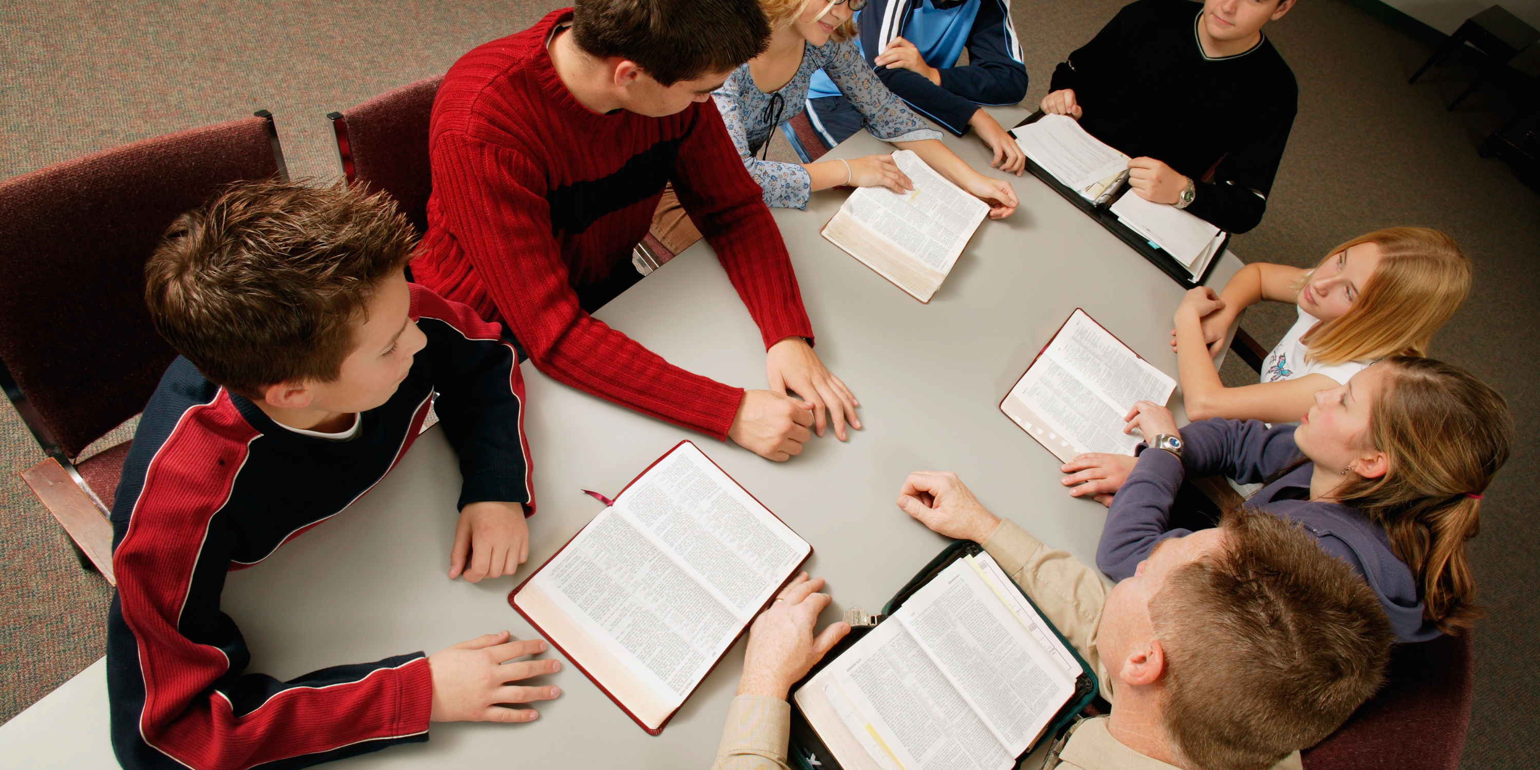 A group of young people gathered for Bible study