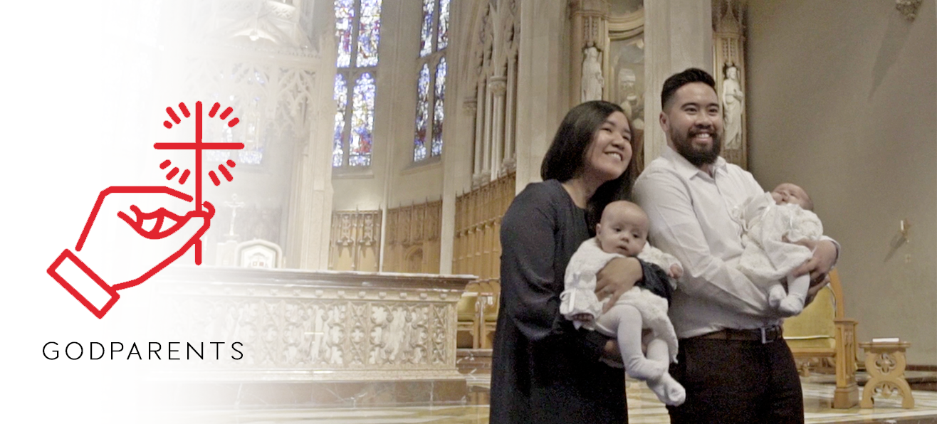 Godparents holding babies at baptism