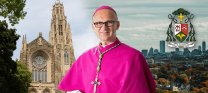 Bishop Joseph Dabrowski, CSMA, tenth Bishop of Hamilton is situated in front of the Cathedral Basilica of Christ the King as well as a landscape view of the city of Hamilton.